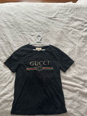 Gucci Black T-Shirt with Gold Logo and Green-Red Stripe